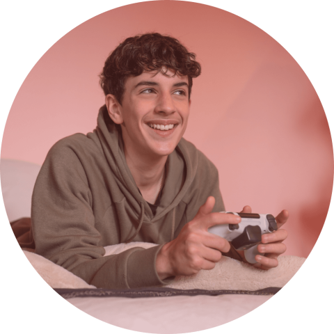 Teenage boy playing video game